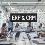 Business professionals discussing ERP and CRM integration in modern office